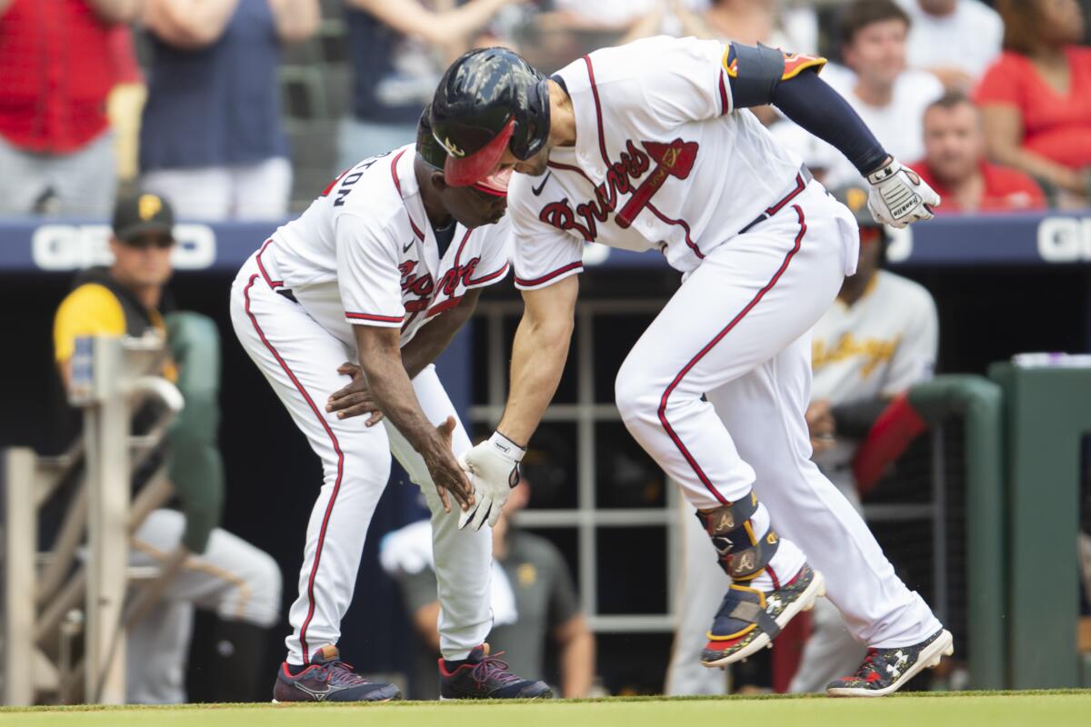 Braves win 11th straight, Phils have 9-game streak stopped - West