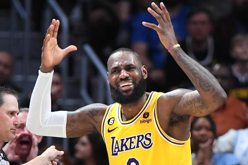 Denver, Colorado May 16, 2023-Lakers LeBron James wants a foul called against the Nuggets.