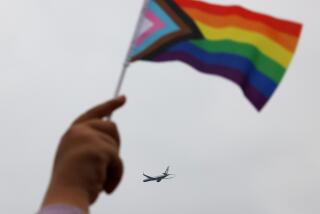 EL-SEGUNDO-CA-JUNE 1, 2024: A Pride flag waves as Vice President Kamala Harris departs Los Angeles International Airport on Air Force 2 for a political event in Seattle, Washington on June 1, 2024. (Christina House / Los Angeles Times)