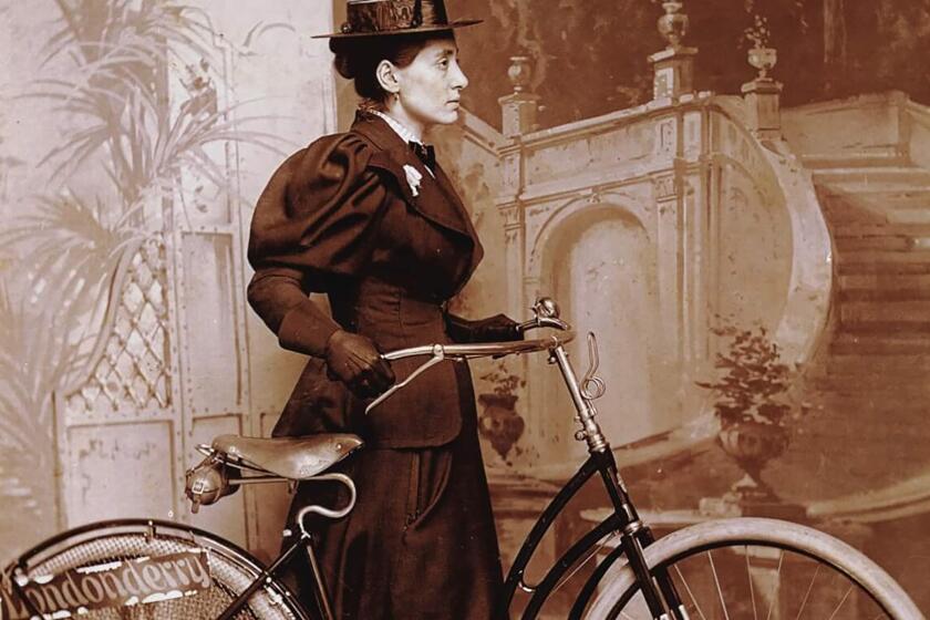 An archival photograph of Annie Londonderry, who biked around the world in the 1890s.  