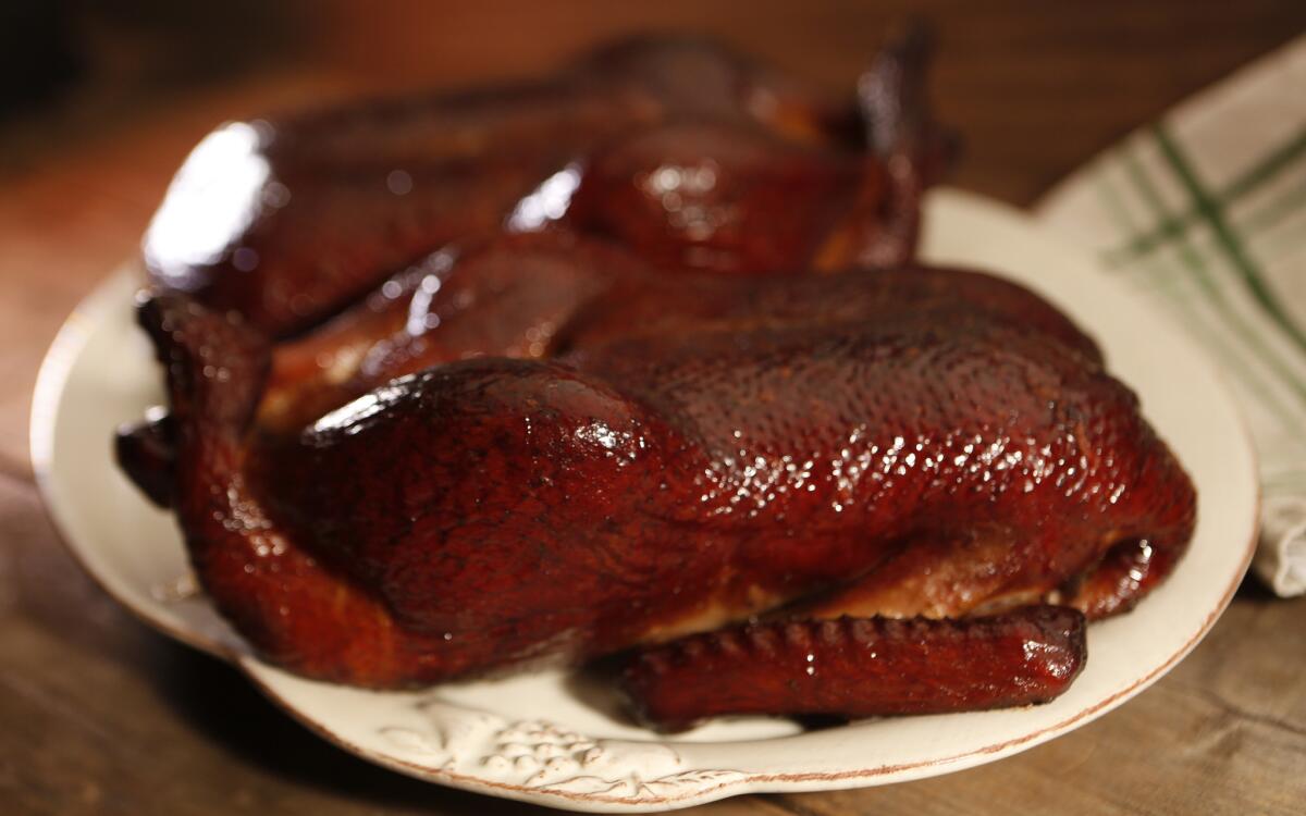 Maple-bourbon smoked duck
