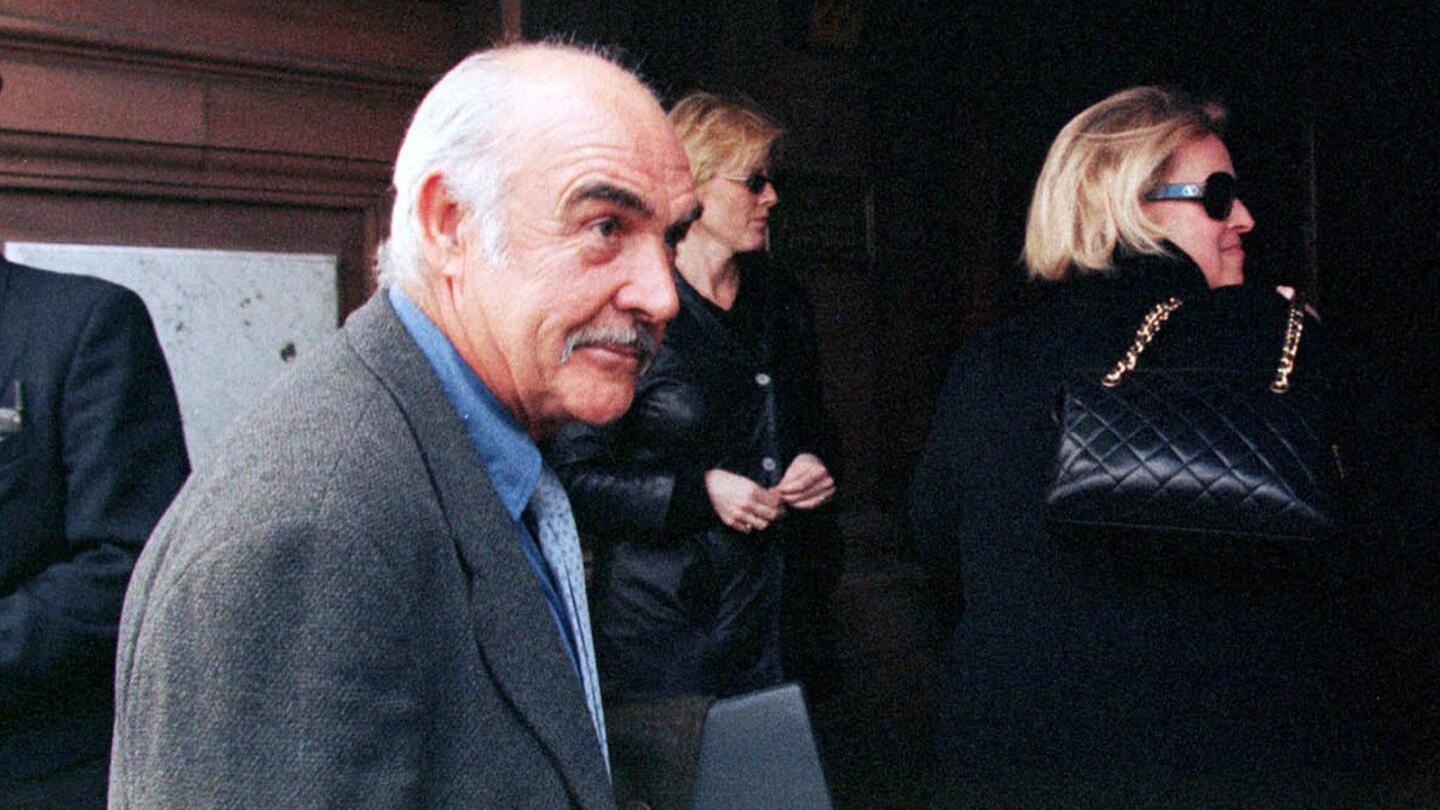 Connery and his wife, Micheline, attend the Scottish National Party's election campaign on April 23, 1999, in Edinburgh.