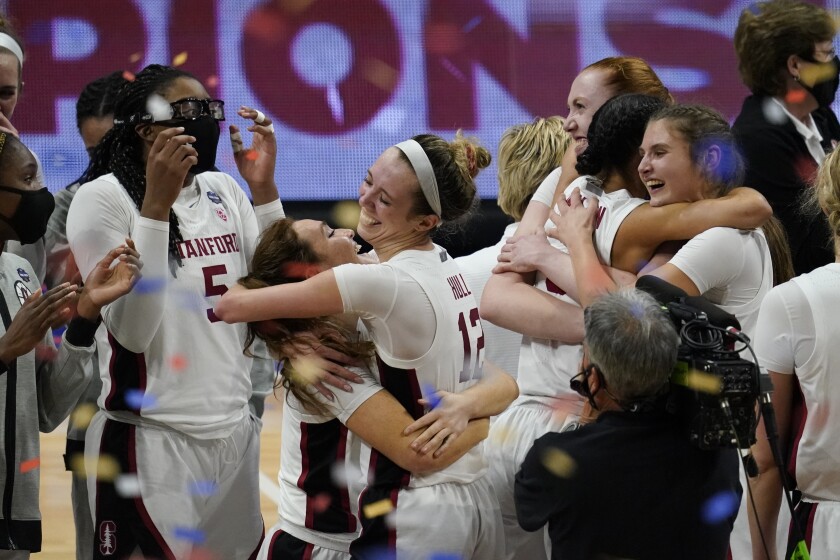 Stanford players celebrate at the end of the championship game against Arizona.