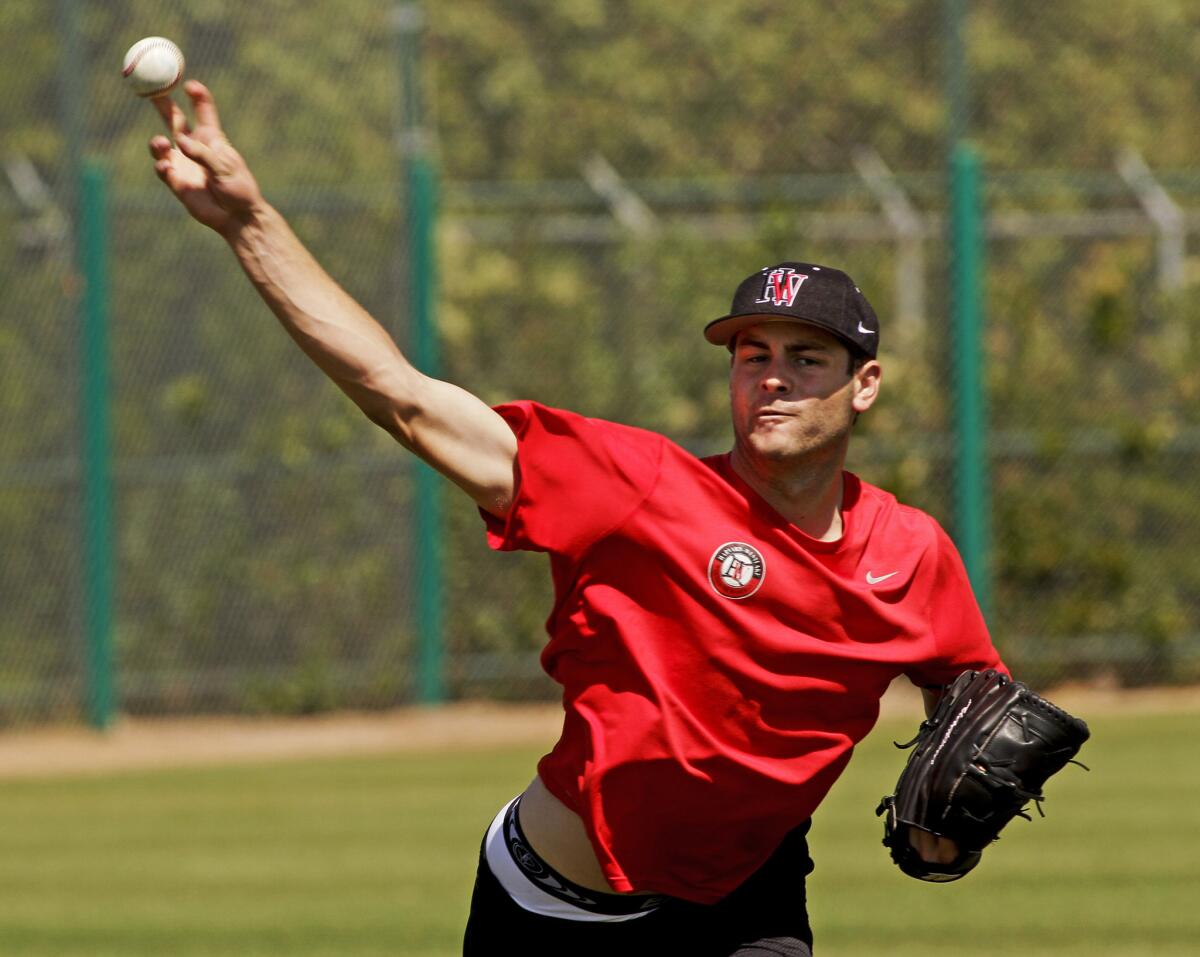 Harvard Westlake graduate Lucas Giolito pitches in front of scouts on May 23, 2012 before he was drafted by the Nationals.