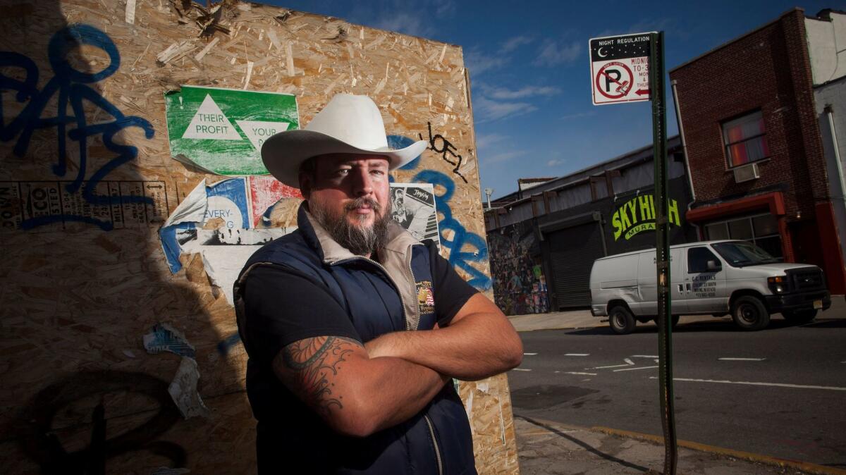 Shane Smith, co-founder and chief executive of Vice, poses for a portrait in 2013 in Brooklyn.