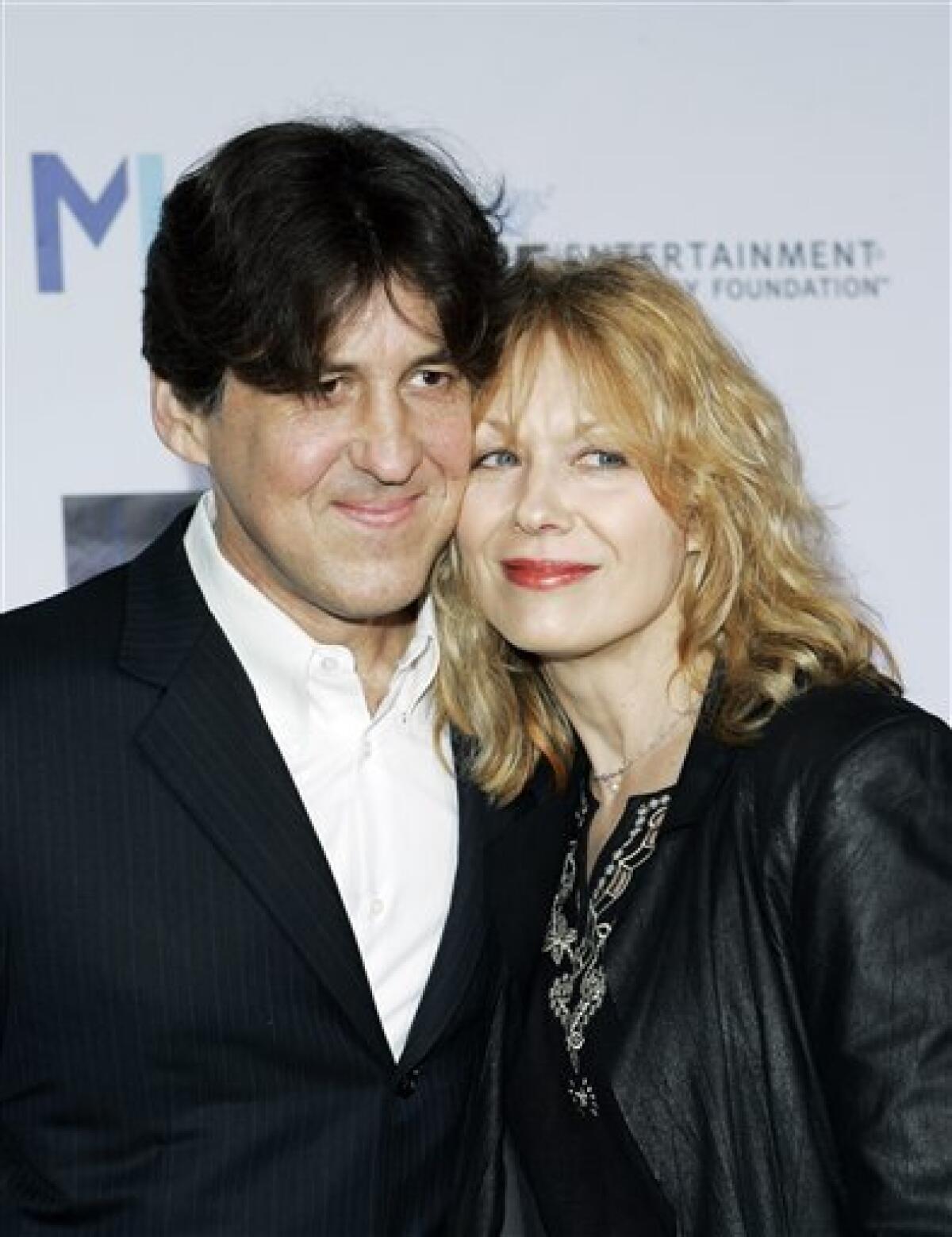 FILE - In this March 22, 2007 file photo, director Cameron Crowe and his wife Nancy Wilson arrive at Mentor LA's Promise Gala honoring Tom Cruise for his commitment to the welfare of LA's youth in Los Angeles. (AP Photo/Kevork Djansezian, file)