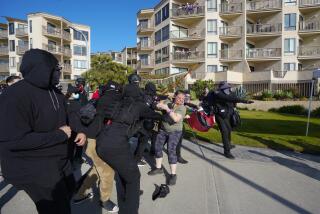 SAN DIEGO, CA - JANUARY 07: On Thursday, Jan. 9, 2021 in San Diego, CA., at Pacific Beach in San Diego, Antifa members clash with an individual on the boardwalk just south of Crystal Pier. (Nelvin C. Cepeda / The San Diego Union-Tribune)