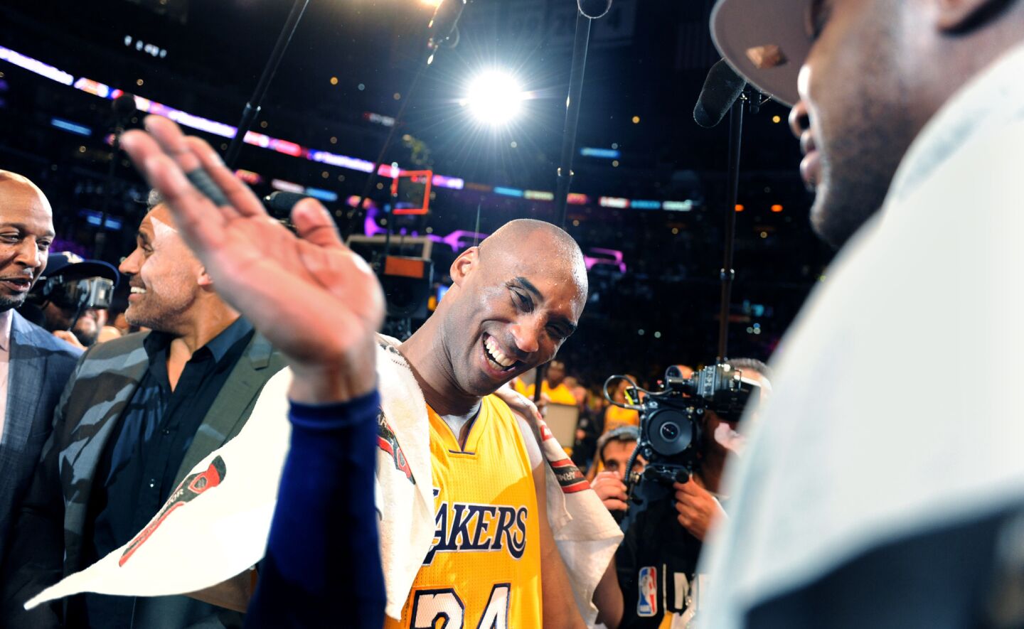 Kobe Bryant greets Lamar Odom after his final game at Staples Center.