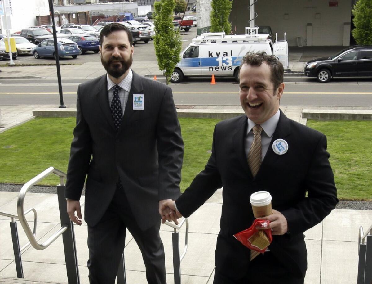 Ben West, left, and Paul Rummell are two of the plaintiffs in the lawsuit asking for Oregon's same-sex marriage ban to be ruled unconstitutional.