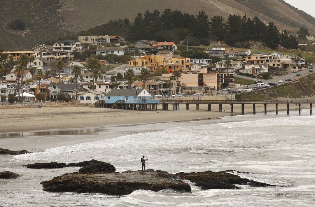 A man fishes at Avila Beach in San Luis Obispo County.
