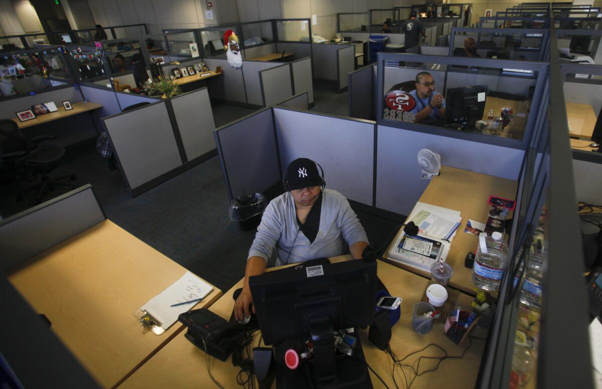 311 operators answer hundreds of calls from residents all over Los Angeles in City Hall East.