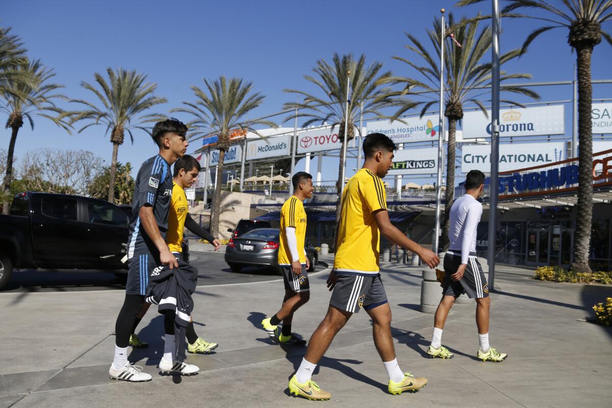 LA Galaxy Youth Academy athletes walk to lunch together after practice at the StubHub Center.