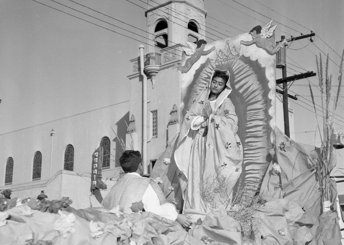 Maria Duran portrays Our Lady of Guadalupe on a float