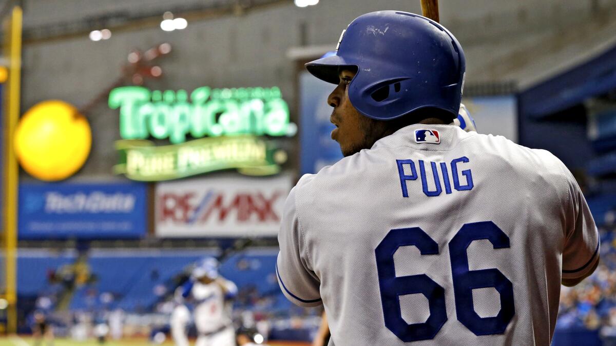 Dodgers right fielder Yasiel Puig prepares for his turn to bat during a game at Tampay Bay on Wednesday.
