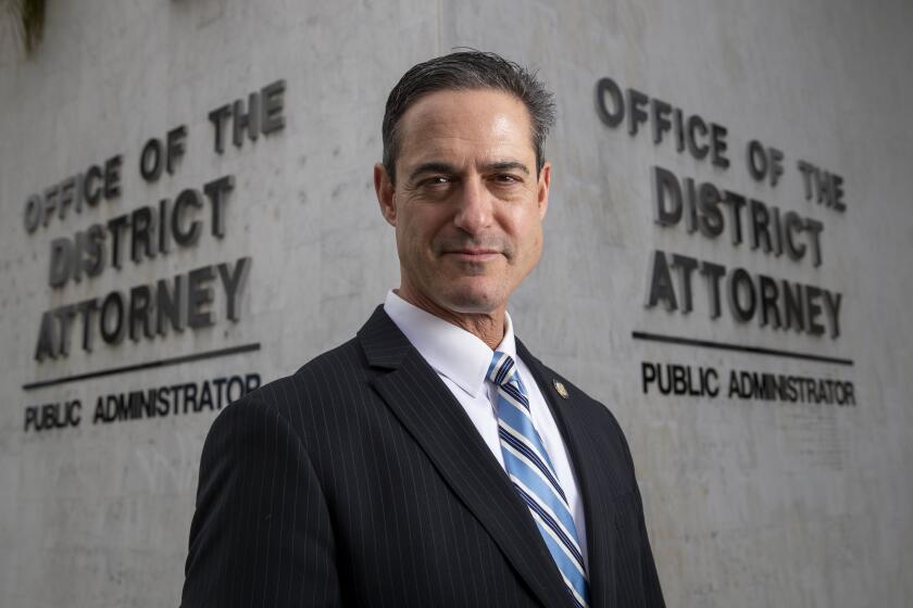Photographs by Allen J. Schaben  Los Angeles Times ORANGE COUNTY DIST. ATTY. Todd Spitzer reversed course from his predecessor by adding four deputies connected to a jail informant scandal to a list of problem officers whose records must be disclosed at trials.