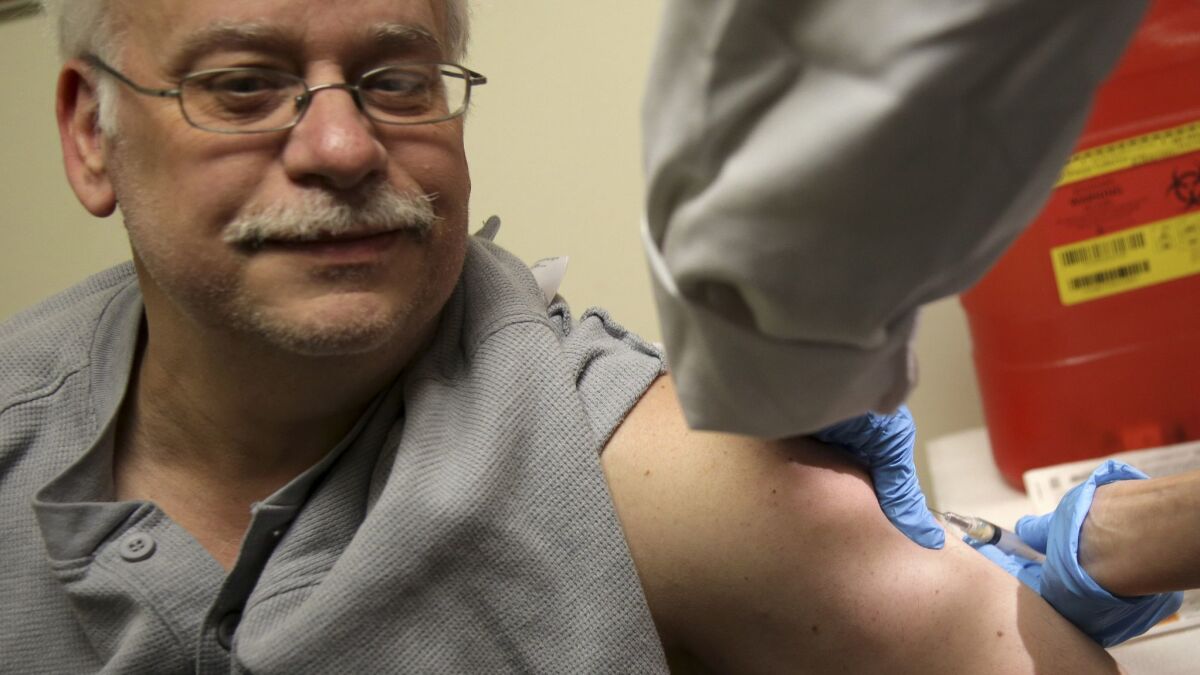 Steve Sierzega receives a measles, mumps and rubella vaccine at the Rockland County Health Department in Pomona, N.Y. on Wednesday.