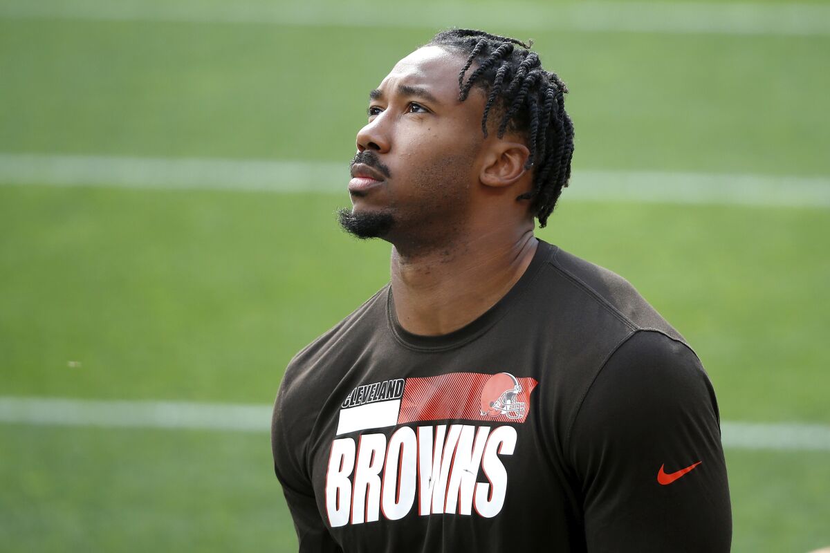 Cleveland Browns defensive end Myles Garrett walks on the field prior to the start of a game.