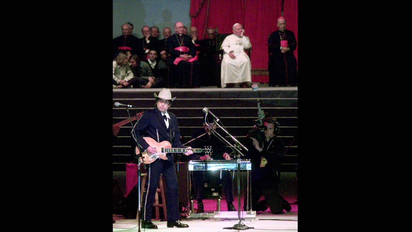 Dylan performed one of his best-known songs, "Knockin' on Heaven's Door" in front of Pope John Paul II in Bologna, Italy on Sept. 27, 1997, before an estimated crowd of 300,000