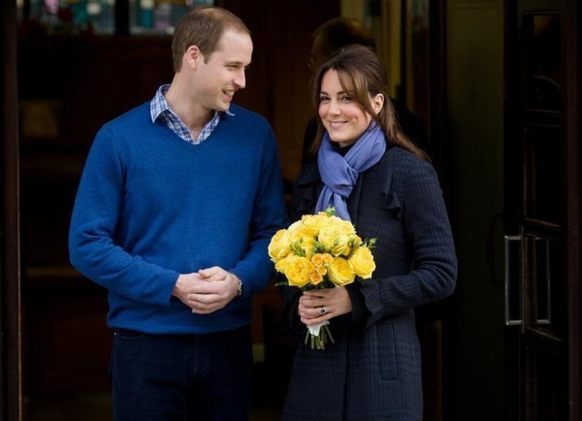 The Duke and Duchess of Cambridge exit King Edward VII hospital in London on Thursday, following Duchess Kate's treatment for hyperemesis gravidarum, a form of severe morning sickness.