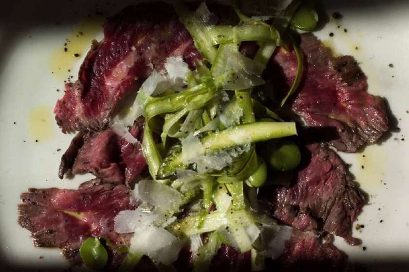Recipe: Skirt steak carpaccio with raw asparagus and fava salad