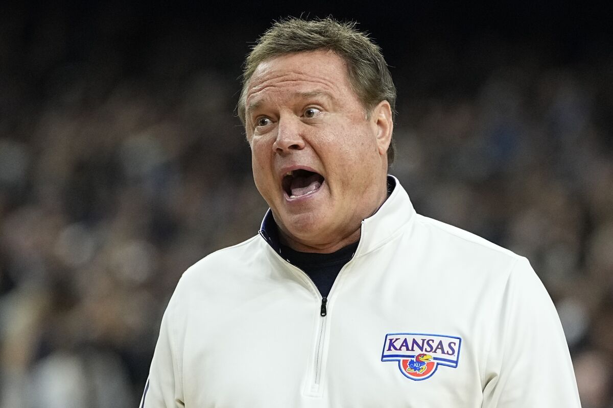 Kansas head coach Bill Self yells during the first half of a college basketball game against Villanova in the semifinal round of the Men's Final Four NCAA tournament, Saturday, April 2, 2022, in New Orleans. (AP Photo/David J. Phillip)