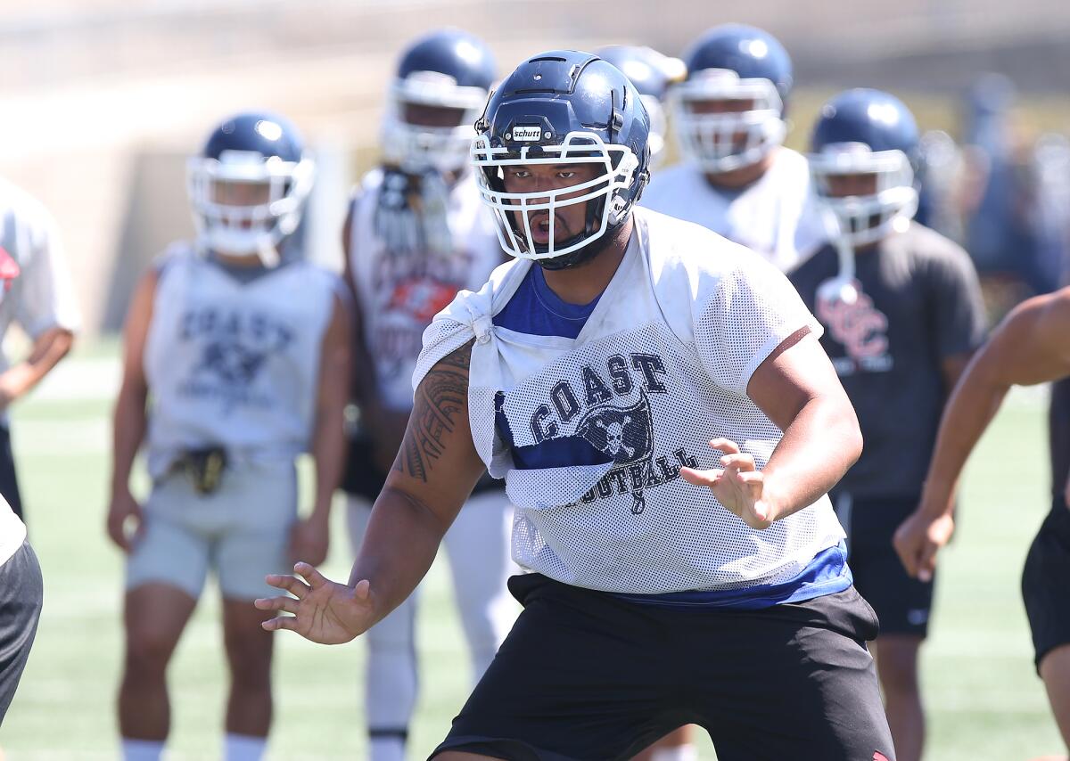 Tackle Riden Leong, seen practicing at Orange Coast College on Friday, has four NCAA Division I scholarship offers.