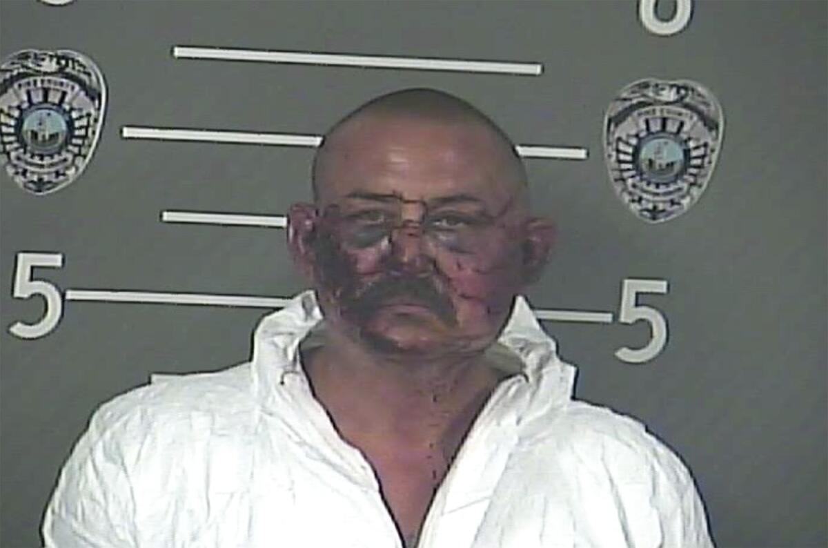 This booking photo provided by Pike County, Kentucky, jail shows Lance Storz. Two officers were killed when Storz. opened fire on police attempting to serve a warrant at a home in eastern Kentucky Thursday, June 30, 2022, authorities said. Several officers were shot at the scene in Floyd County. Police took Storz into custody late Thursday night, according to media reports. (Pike County, Kentucky, jail via AP)