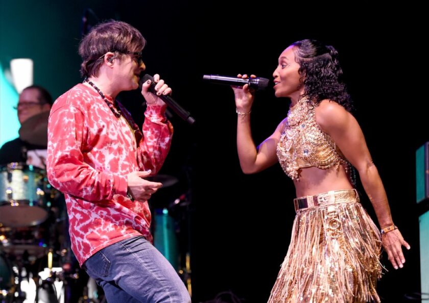  Rivers Cuomo of Weezer (left) and Rozonda "Chilli" Thomas of TLC perform at Coachella on April 13.