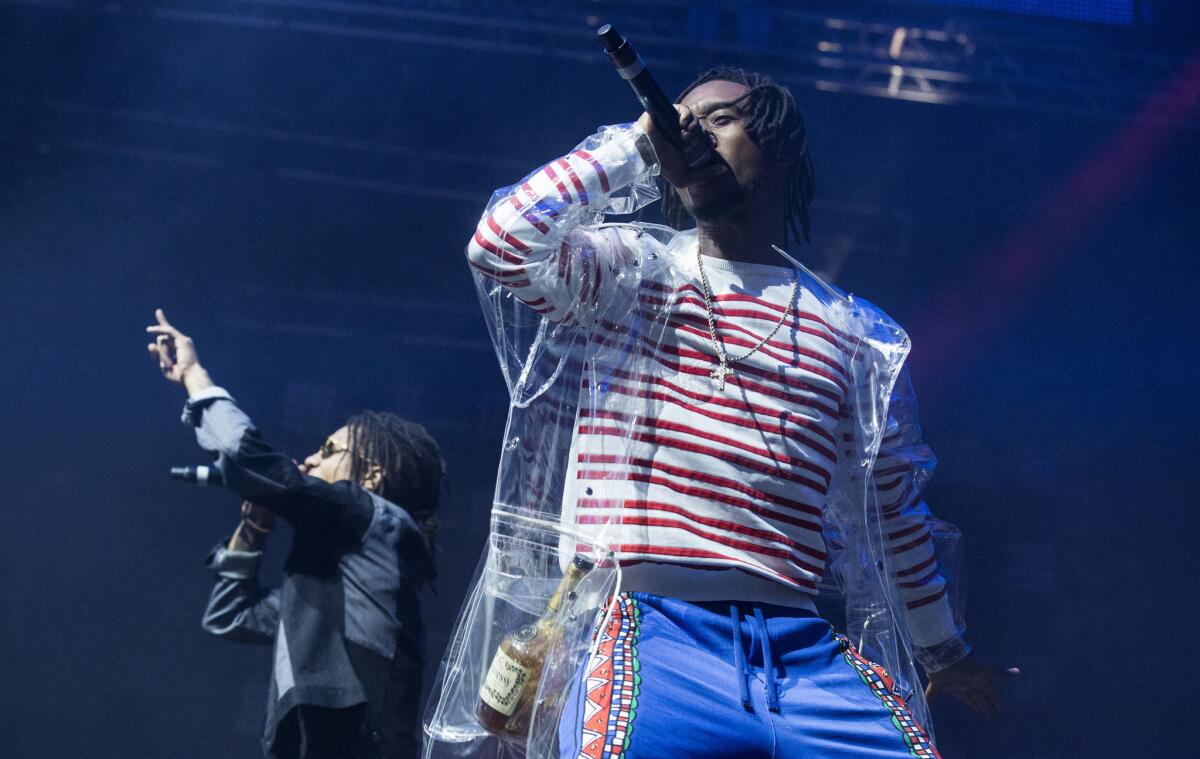 Rae Sremmurd's Swae Lee, left, and brother Slim Jxmmi perform at the Coachella Valley Music and Arts Festival on April 15.
