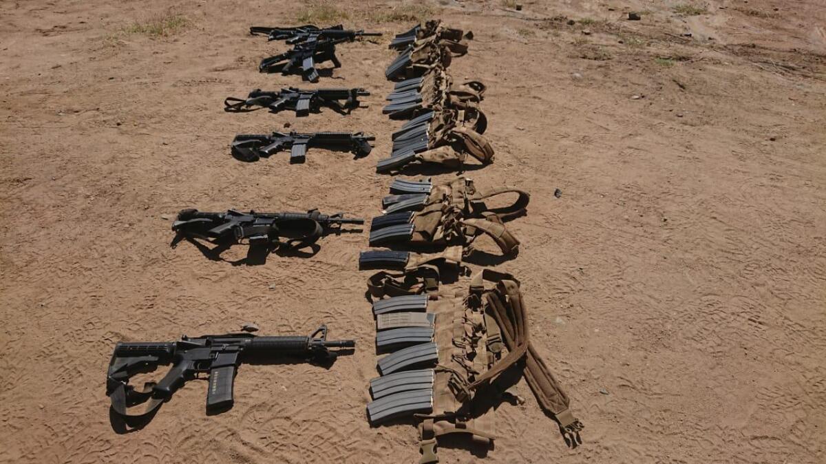 Mexican Army arrests two men in California truck full of AR-15 rifles and heavy-gauge machine guns.