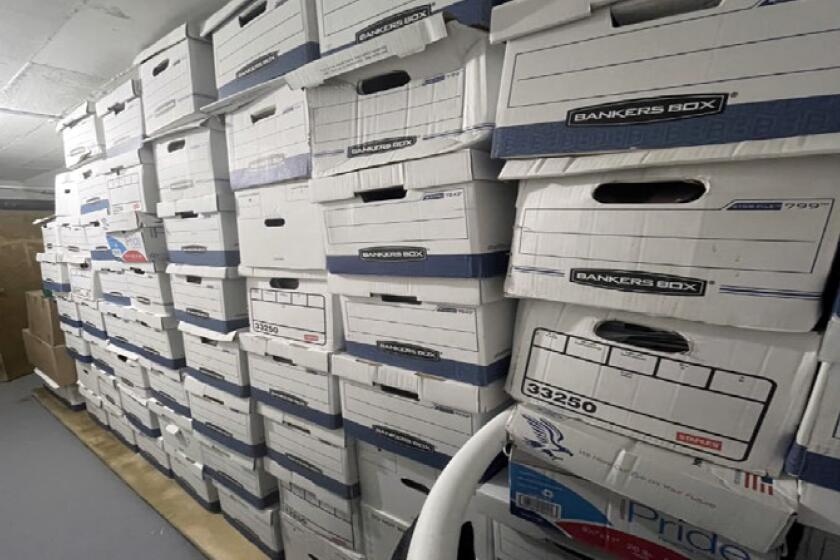This image, contained in the indictment against former President Donald Trump, shows boxes of records in a storage room at Trump's Mar-a-Lago estate in Palm Beach, Fla., that were photographed on Nov. 12, 2021. Trump is facing 37 felony charges related to the mishandling of classified documents according to an indictment unsealed Friday, June 9, 2023. (Justice Department via AP)