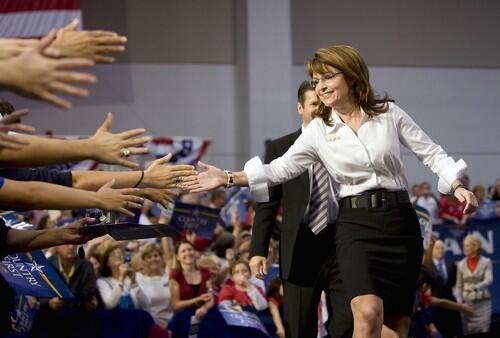 Vice presidential candidate Sarah Palin gets a warm greeting from supporters as she arrives for a rally in Virginia Beach, Va.