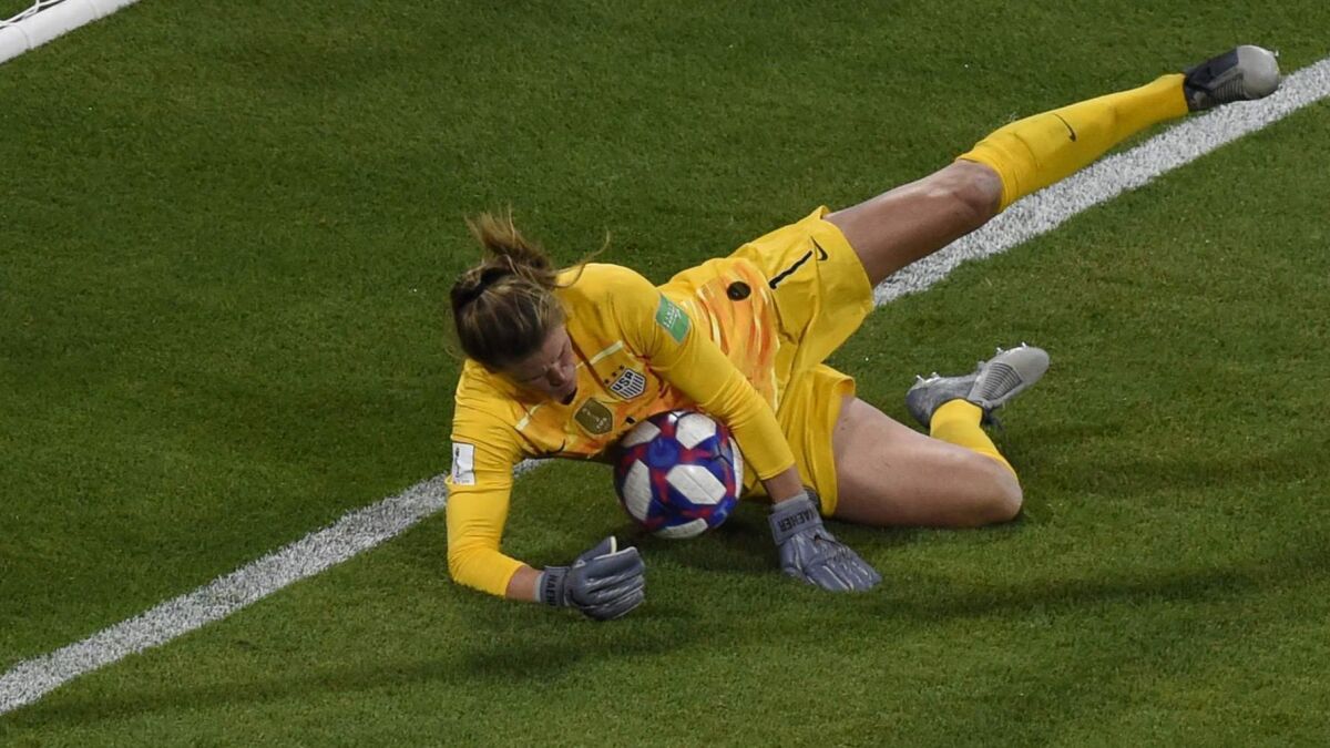 U.S. goalkeeper Alyssa Naeher stops a penalty kick to preserve a 2-1 victory over England in the Women's World Cup semifinals in France on Tuesday.