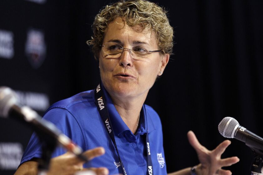 FILE -U.S. Olympic team head coach Teri McKeever speaks during a news conference at the U.S. Olympic swimming trials, Sunday, June 24, 2012, in Omaha, Neb. Longtime University of California women's swimming coach Teri McKeever was fired Tuesday, Jan. 31, 2023 following an investigation into alleged harassment, bullying and verbally abusive conduct, the school said in a statement. (AP Photo/Charlie Neibergall, File)
