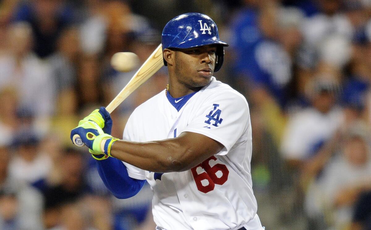Dodgers outfielder Yasiel Puig hit .296 with 16 home runs during the 2014 regular season.