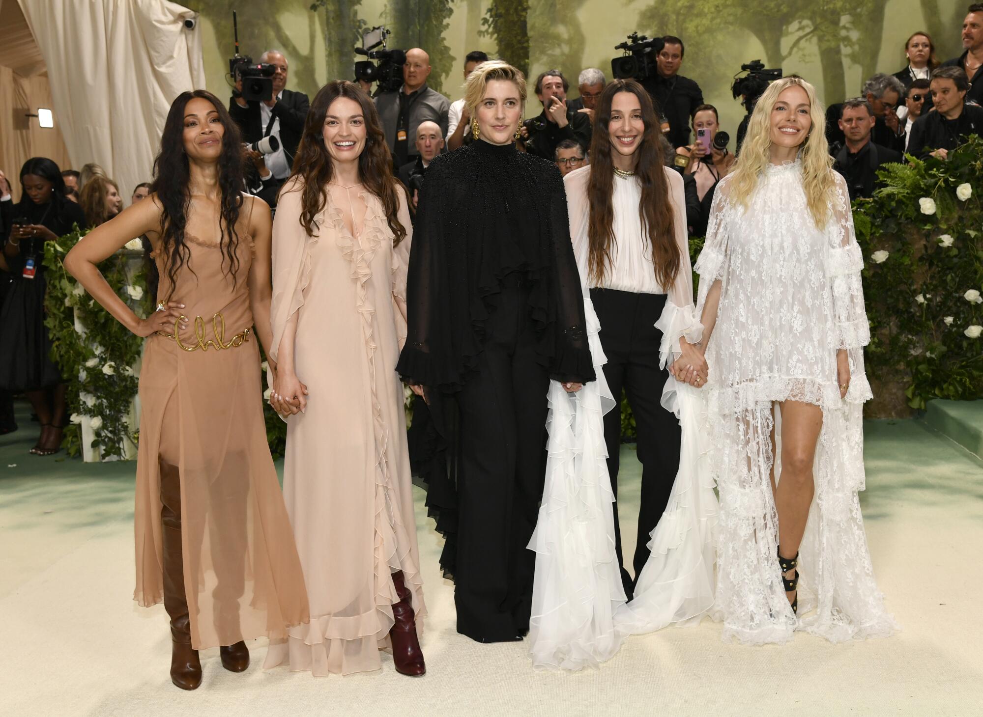 From left, Zoe Saldana, Emma Mackey, Greta Gerwig, Chemena Kamali, Sienna Miller.