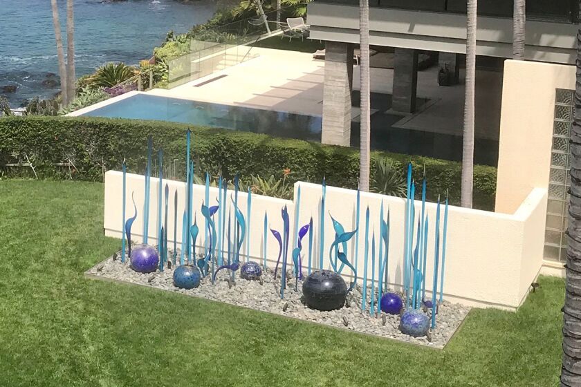 Blown glass sculpture by artist Dale Chihuly installed at the Laguna Beach yard of Bill Gross and Amy Schwartz.