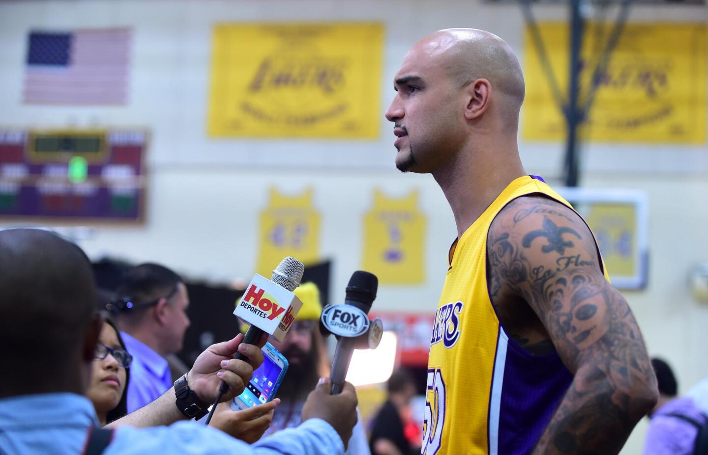 Robert Sacre of the Los Angeles Lakers is interviewed during the Los Angeles Lakers media day on September 28, 2015 in El Segundo, California. AFP PHOTO / FREDERIC J. BROWNFREDERIC J. BROWN/AFP/Getty Images ** OUTS - ELSENT, FPG, CM - OUTS * NM, PH, VA if sourced by CT, LA or MoD **