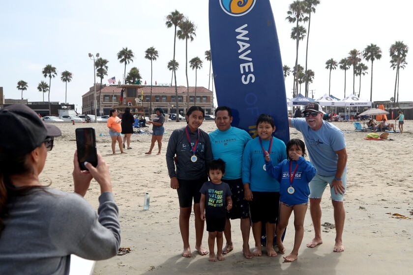 Francisco Paxtor, 10, third from right, smiles for a photo.