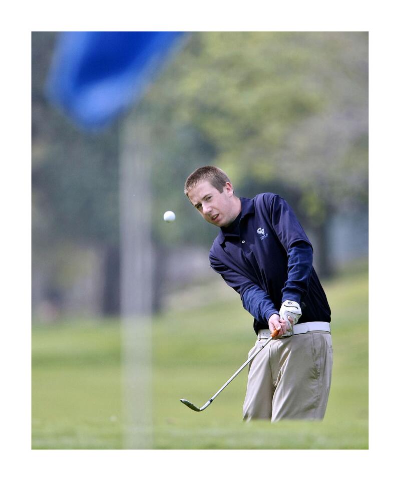 Crescenta Valley High School's Cody Renfro chips the ball towards the pin during the De Bell Golf Club's 49th Annual High School Invitational at the course in Burbank on Wednesday, March 20, 2013. Schools from throughout L.A. County participated.