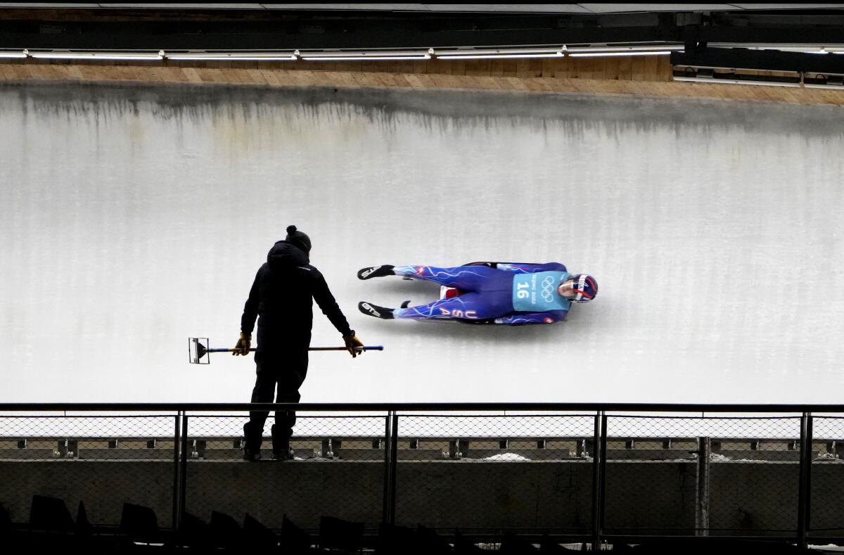 Summer Britcher of the United States takes a practice run during the women's singles luge training at the 2022 Winter Olympics, Thursday, Feb. 3, 2022, in the Yanqing district of Beijing. (AP Photo/Dmitri Lovetsky)