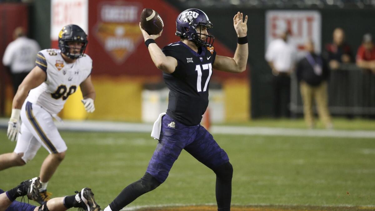 TCU quarterback Grayson Muehlstein (17) throws a pass as California linebacker Evan Weaver, left, watches during the first half.