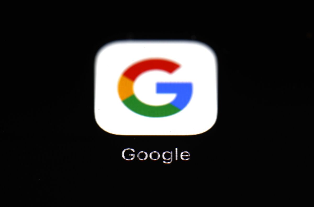 A Google app icon button on a black screen