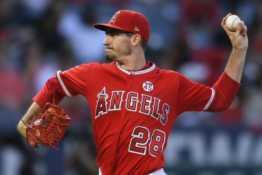 ANAHEIM, CA - AUGUST 27: Andrew Heaney #28 of the Los Angeles Angels pitches in the first inning agaisnt the Texas Rangers at Angel Stadium of Anaheim on August 27, 2019 in Anaheim, California. (Photo by John McCoy/Getty Images)