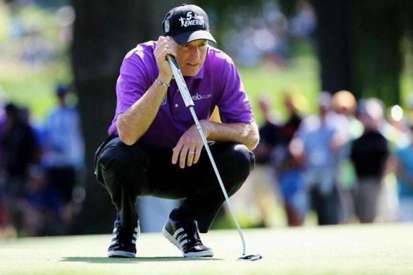 Jim Furyk lines up a putt at No. 4 during the third round of the PGA Championship on Saturday at Oak Hill Country Club in Rochester, N.Y.