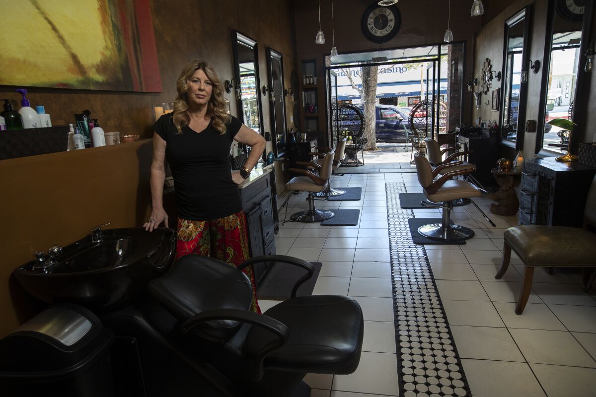 Elaina Wilcox, owner of Color & Craft Salon, in her empty Culver City salon on May 6.