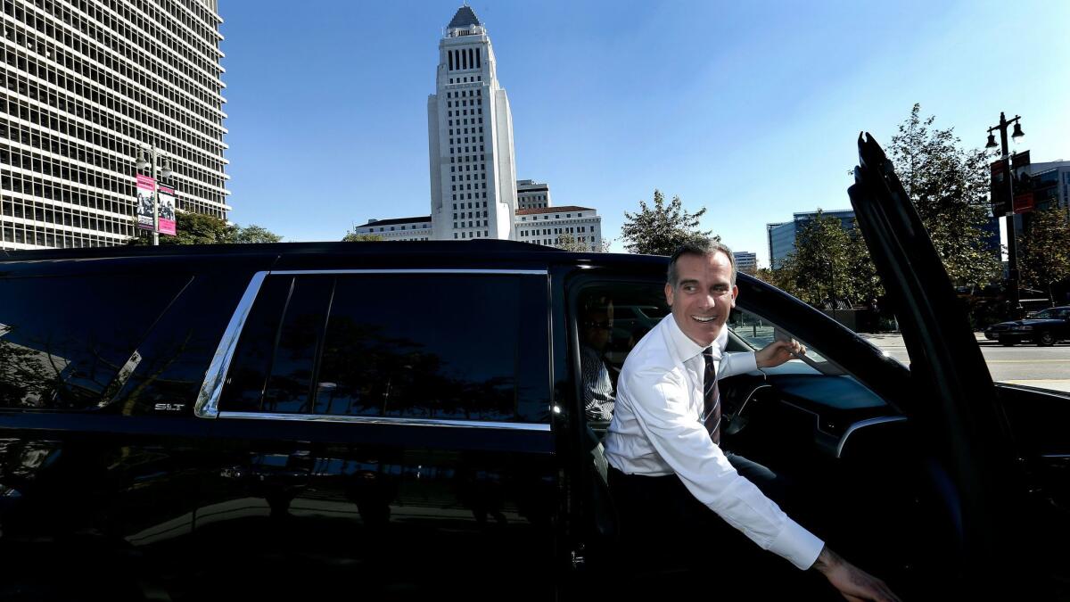 Los Angeles Mayor Eric Garcetti leaves Grand Park in downtown L.A. after a news conference on the city's bid to host the 2024 Olympics on Jan. 25.