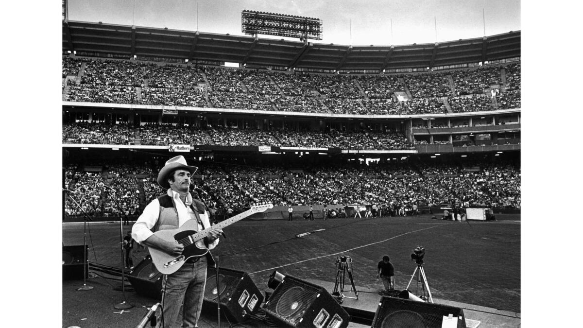 Oct. 26, 1980: Merle Haggard performs before 30,000 fans at Anaheim Stadium.