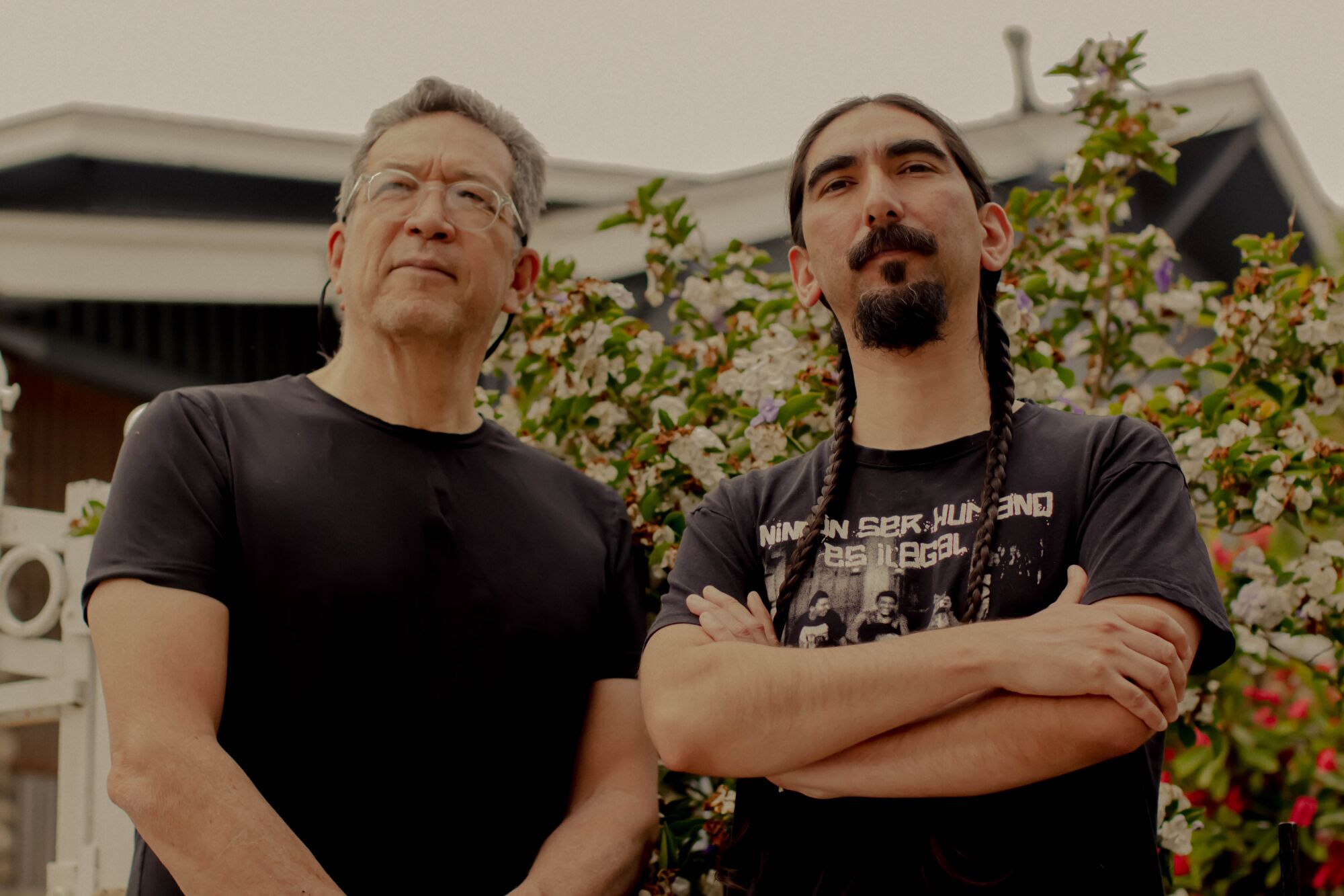 A photo of Sesshu Foster and Arturo Romo.