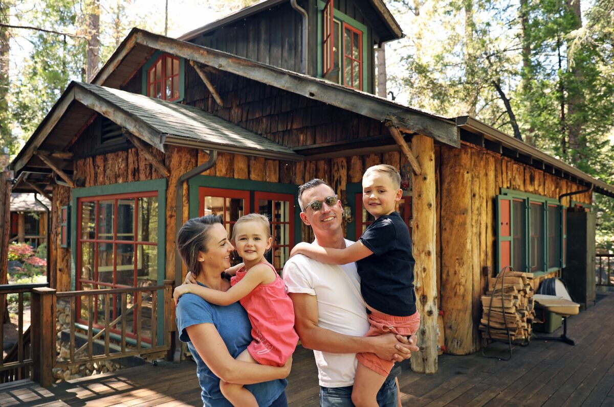 The Donovan family left Silver Lake for Idyllwild after visiting a for-sale home on a lark. Catherine with Bon, age 4, and Michael with Tate, 7.